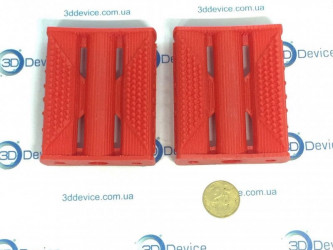3D-printed bicycle pedals with red filament by 3DDevice.