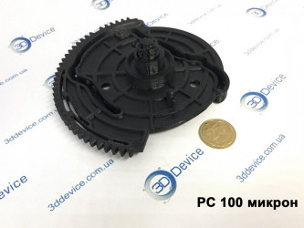 3D-printed Polycarbonate PC 100 microns cam gear prototype next to coin by 3DDevice.