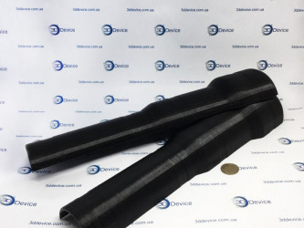 Two black FDM 3D-printed flexible tubes, custom parts shown with a coin by 3DDevice.