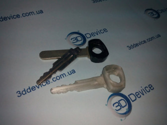 3D printed car flip key fob with immobilizer on the printer. 3DDevice custom parts.