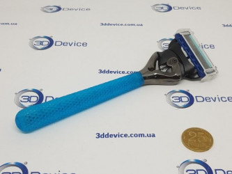 Blue 3D printed razor handle prototype by Formlabs. High-detail SLA 3DDevice printing.