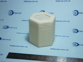 3D printed hexagonal object with honeycomb texture (honey jar or container prototype). 3DDevice custom model printing.