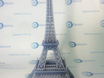 Miniature Eiffel Tower photopolymer 3D printed model. High-detail SLA prototyping and display by 3DDevice.