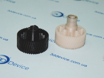 FDM 3D printed helical gears (black and white). Precision mechanical parts prototyping service on Velleman Vertex by 3DDevice: 3ddevice.com.ua.