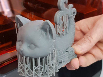 3DDevice printed cat figurine with support structures, grey PLA.