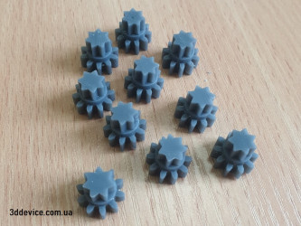 3D-printed complex gear parts with intricate details made from Tough 2000 resin.