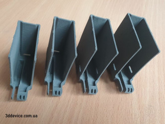A set of four SLS 3D-printed engineering prototypes, made with industrial-grade material from 3DDevice.