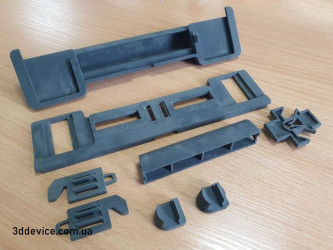 A set of industrial SLS 3D-printed parts with complex shapes from 3DDevice.