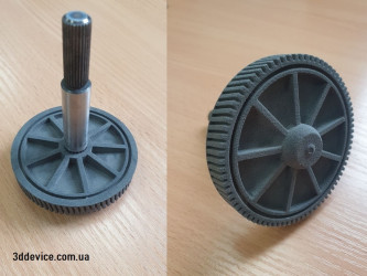 3D printed SLS gear on a metal shaft, an excellent demonstration of hybrid part manufacturing by 3DDevice.