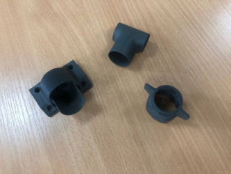 3D printed SLS pipe connectors by 3DDevice for industrial use.
