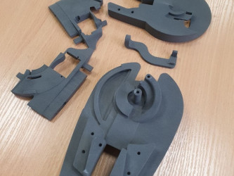Assembly parts printed with SLS technology by 3DDevice for a complex model.