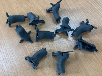 3D printed SLS parts with supports, illustrating the printing process by 3DDevice.