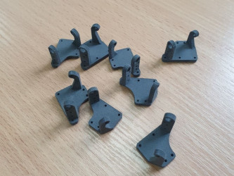 3D printed SLS mounting parts by 3DDevice for industrial and automotive applications.