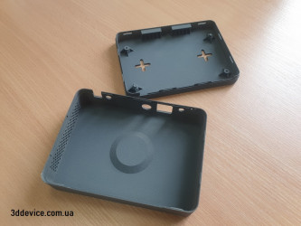 SLS 3D printed housing parts by 3DDevice for an electronic device.