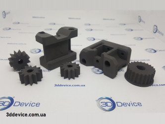 3D printed SLS parts by 3DDevice, including gears and brackets.