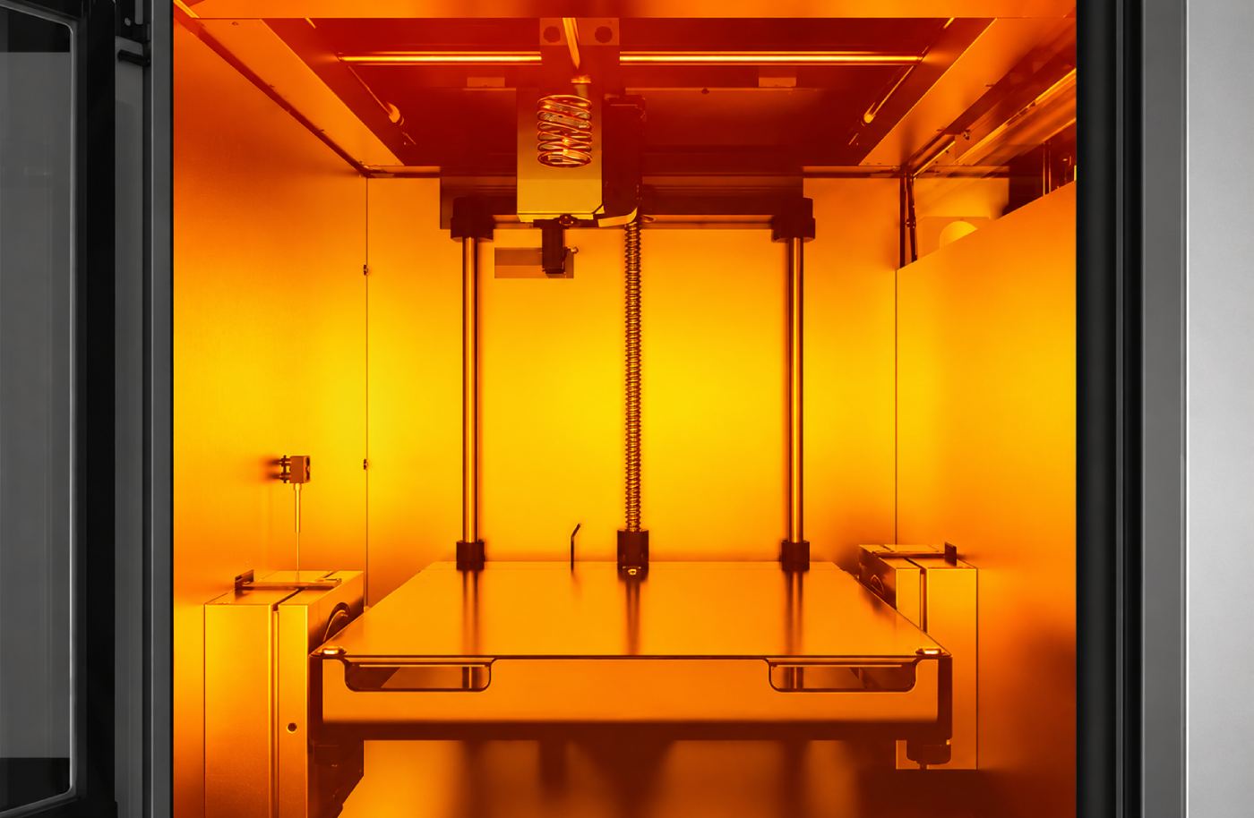 Thermostabilized printing chamber of INTAMSYS FUNMAT HT with uniform heating for manufacturing parts from PEEK, PEI, PPSU, and other high-performance polymers for industrial applications
