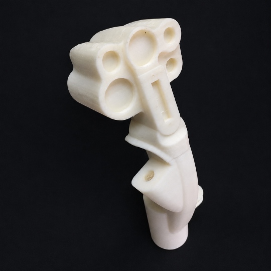 Complex industrial component made of PEEK, manufactured using the high-temperature 3D printer INTAMSYS FUNMAT HT for demanding engineering and production applications